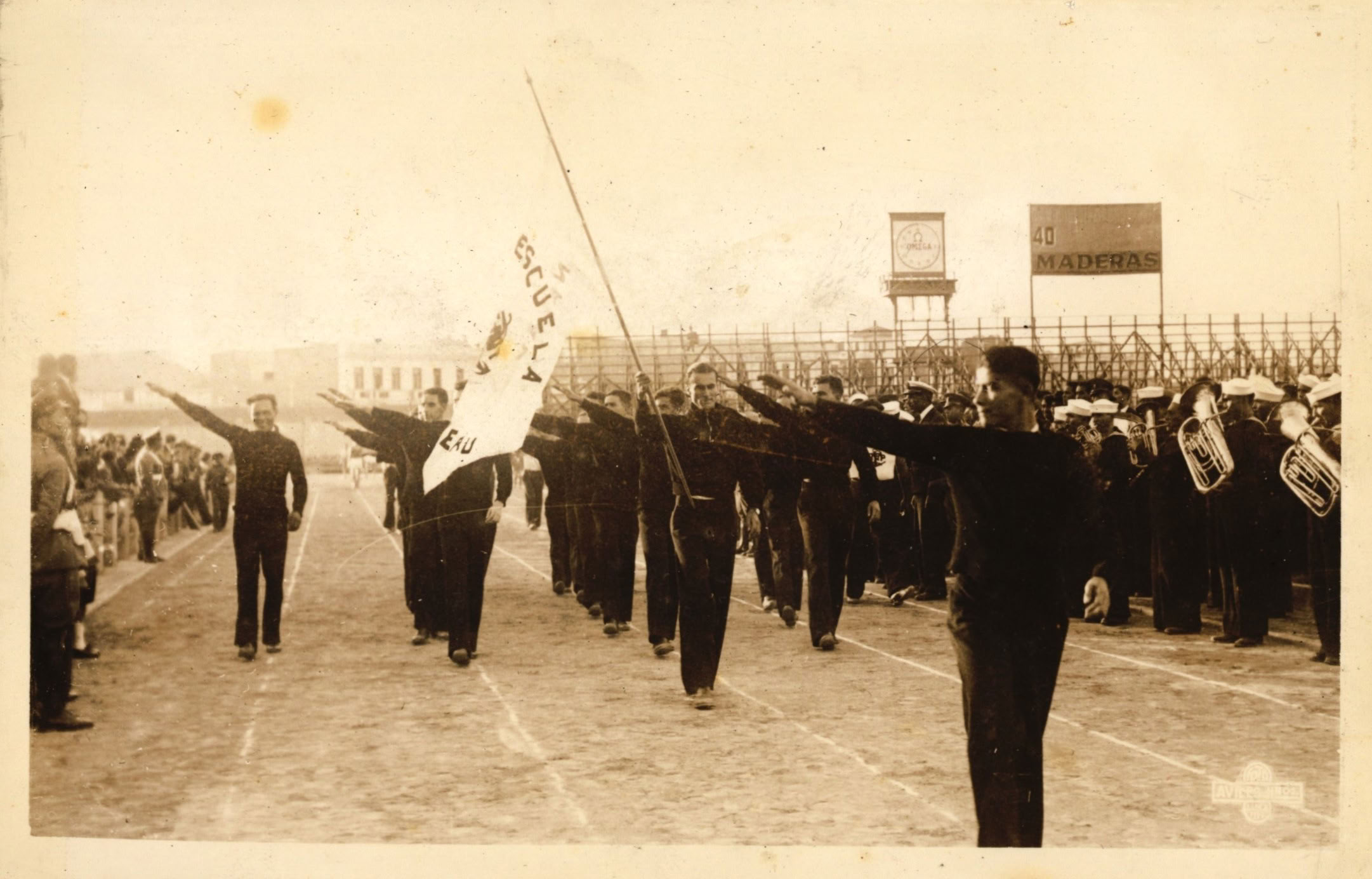 Cadetes de la Escuela Naval desfilando en evento deportivo, c. 1943